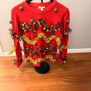 Festive Red Sweater with Green and Gold Accents